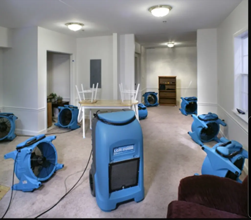 Air movers and dehumidifier setup for Water Damage Restoration in Eastmont